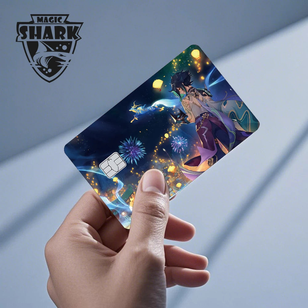 A hand holds an anime dragon PVC card skin sticker featuring a dark, mystical dragon design against a blue background.