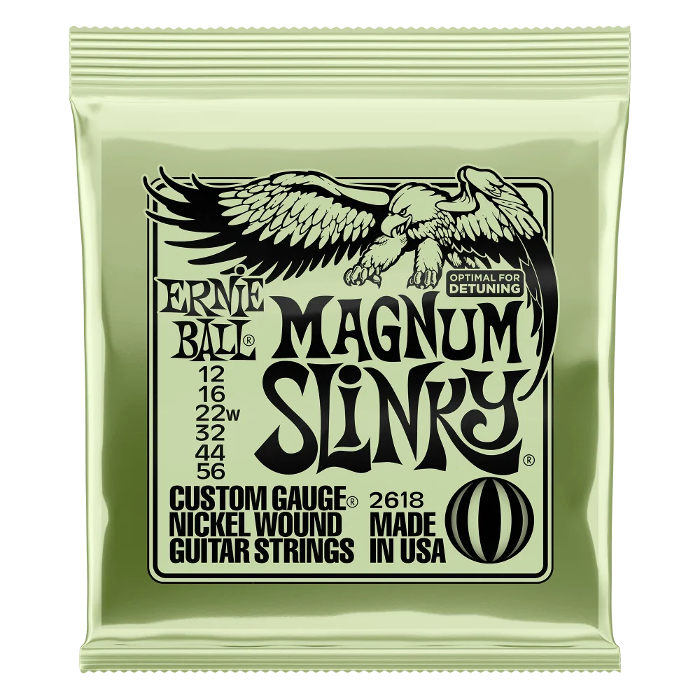 Bag of Ernie Ball Magnum Slinky nickel wound electric guitar strings with an eagle logo.