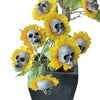 A plant decoration featuring yellow sunflower heads shaped like skulls.