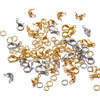 A collection of gold and silver jewelry making components including lobster clasps, jump rings, and crimps.
