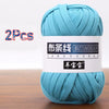 A skein of light blue chunky yarn labeled as Butiaoxian soft T-shirt yarn for crochet and knitting, packaged as a 2-pack.