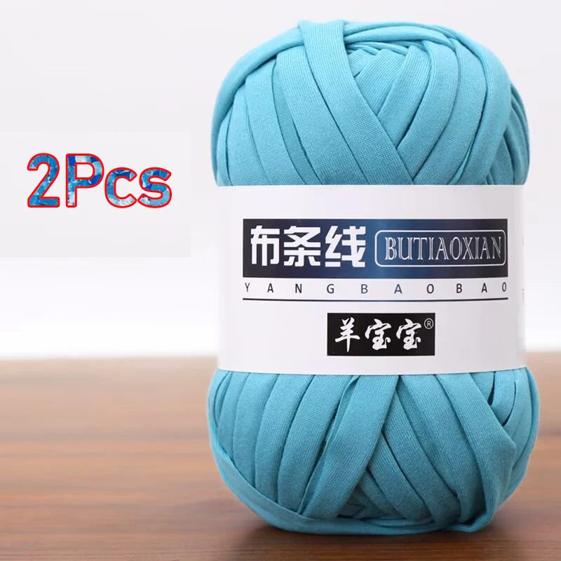 A skein of light blue chunky yarn labeled as Butiaoxian soft T-shirt yarn for crochet and knitting, packaged as a 2-pack.