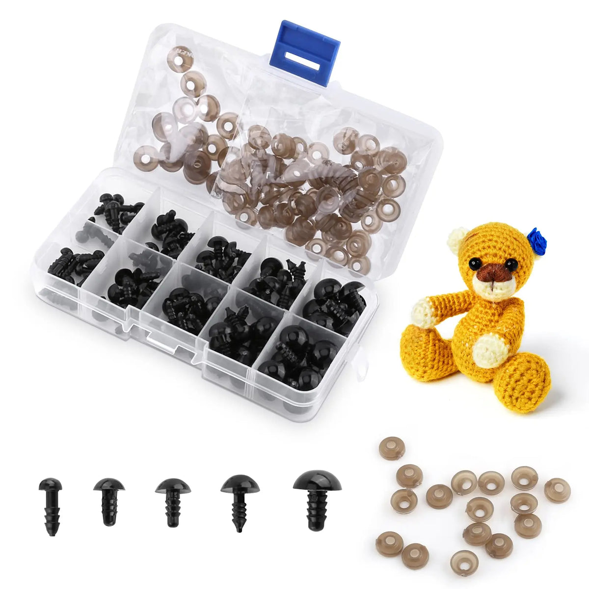 A clear plastic box containing various sizes of black safety eyes for crafting and plush toys, along with loose safety eyes.