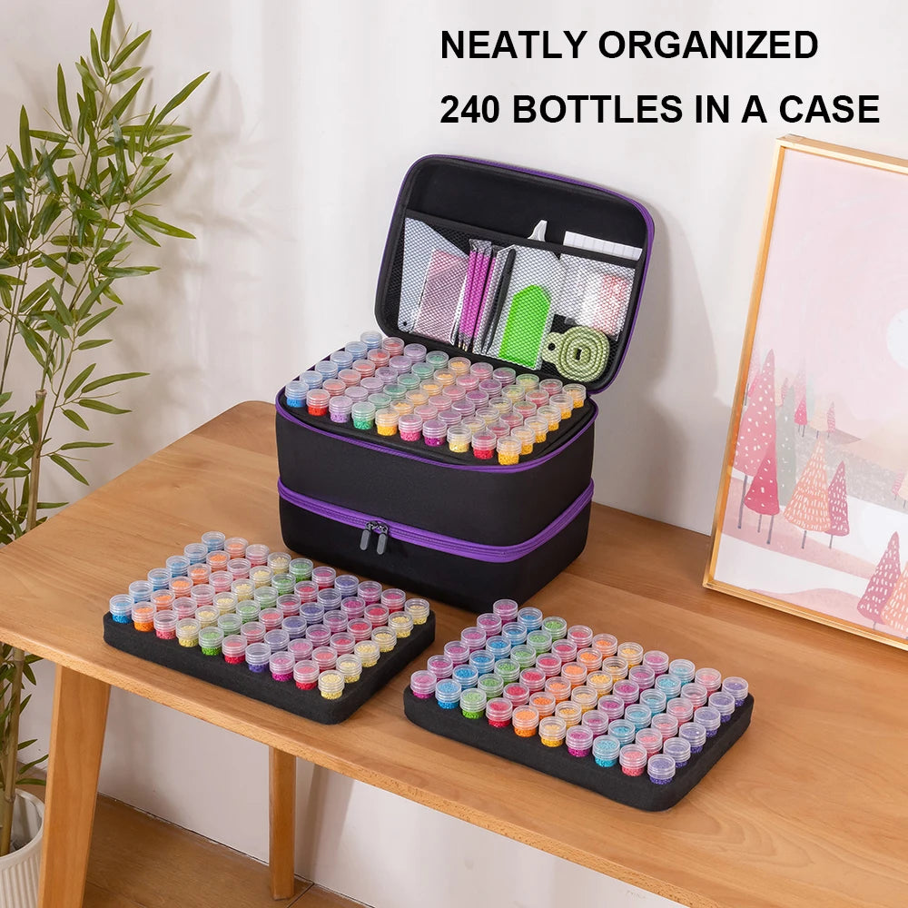 A black storage case holds 240 bottles arranged in organizer trays and tools for diamond art supplies.