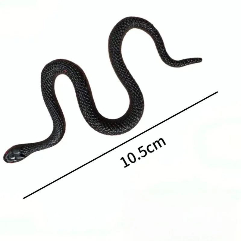 A black rubber snake prop is shown coiled and curved, with a scale indicating its length of 10.5 cm.