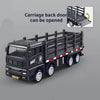 A black pull-back container truck toy with an open back door, showing a side view.