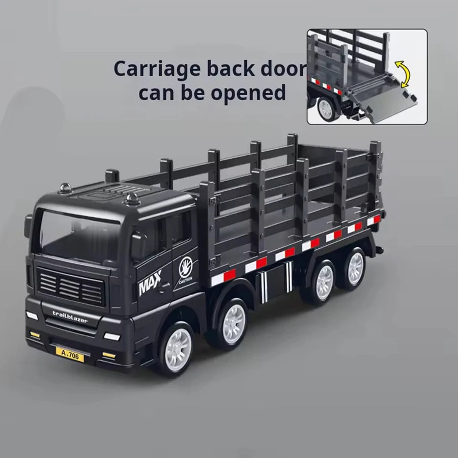 A black pull-back container truck toy with an open back door, showing a side view.