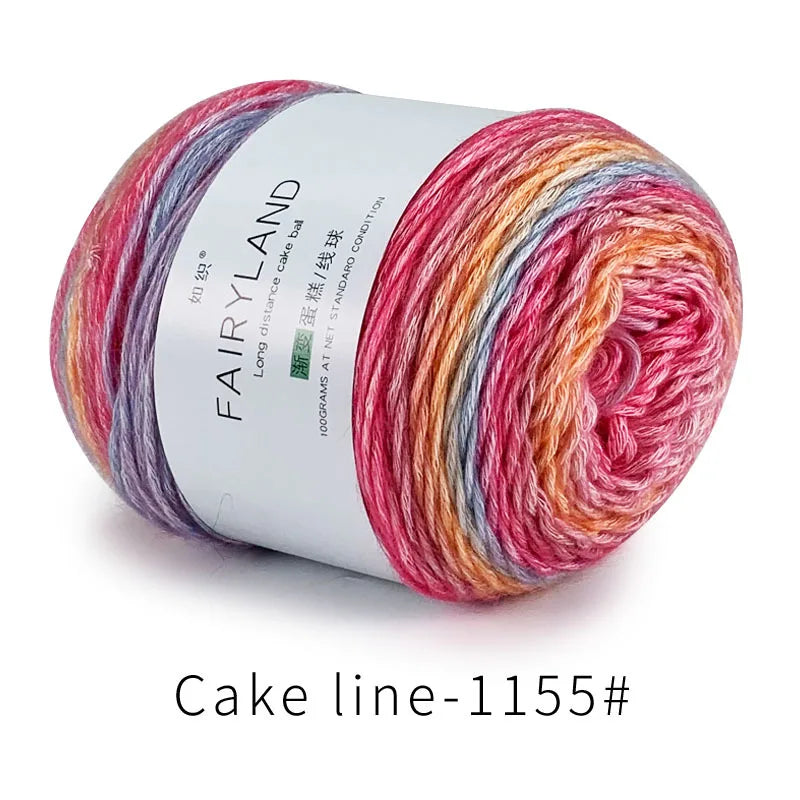 Spool of gradient rainbow cotton-wool yarn for knitting and crochet, labeled as Cake line-1155.