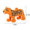 An orange tiger building block set with black stripes, shown from the side.