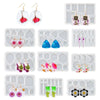 A collection of geometric silicone molds for making epoxy resin earrings and pendants in various shapes and colors.