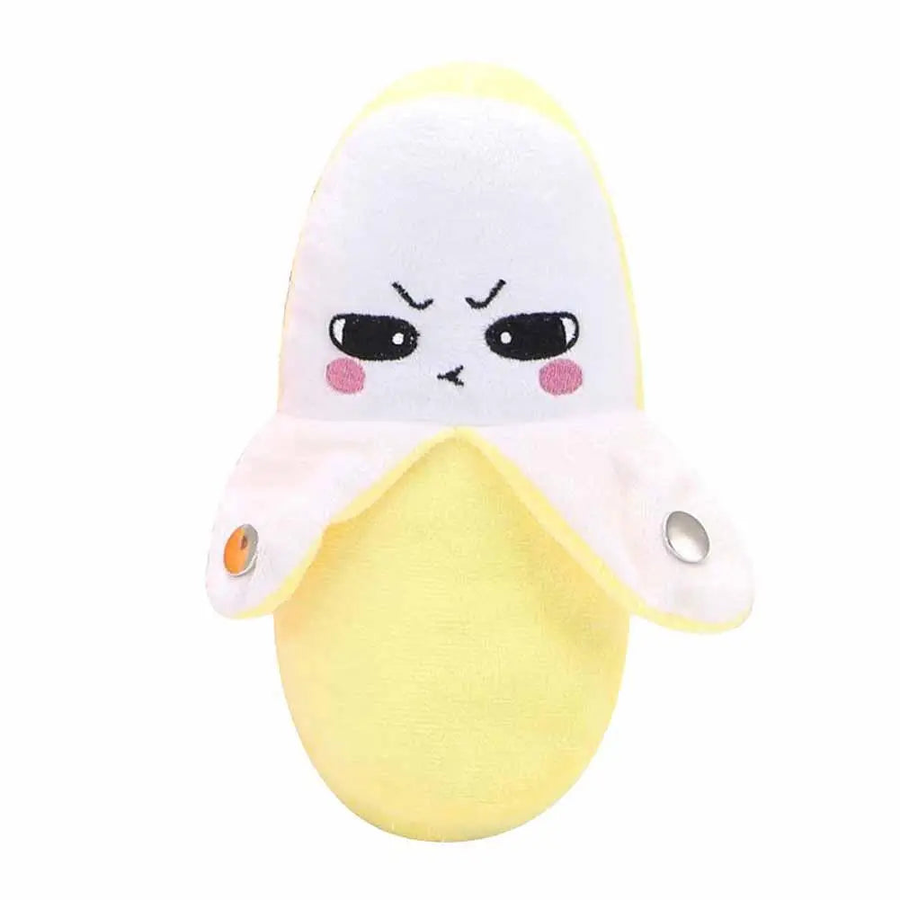 A soft yellow banana-shaped plush toy with a white hood and expressive face.