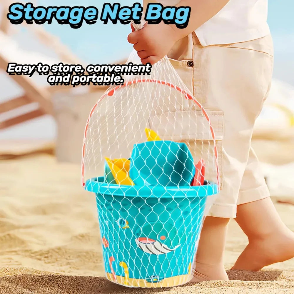 A child holds a clear mesh storage net bag containing an orange and blue plastic cup toy for beach play.