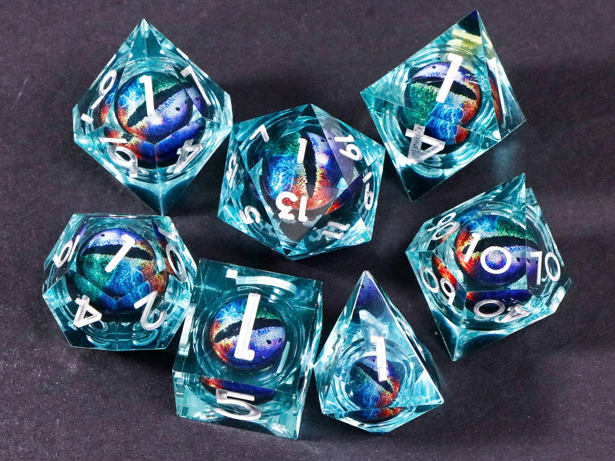 A set of seven translucent blue resin polyhedral dice, including a d4, d6, d8, d10, d12, and d20, displayed on a dark surface