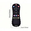 Black remote control shaped baby teether silicone chew toy with various buttons and controls