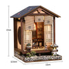 A miniature wooden music room book nook kit featuring detailed architecture and LED lighting.