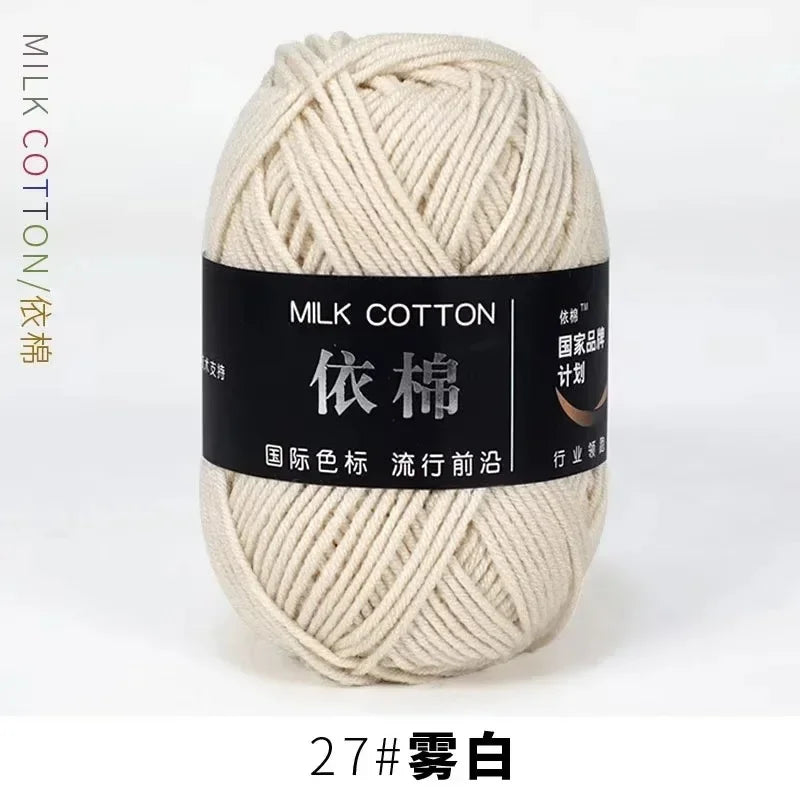 Ball of cream colored milk cotton yarn labeled with Chinese characters and a number 27