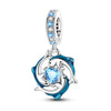 Sterling silver pendant set featuring starfish, sea turtle, and whale shark charms with blue gemstone accents