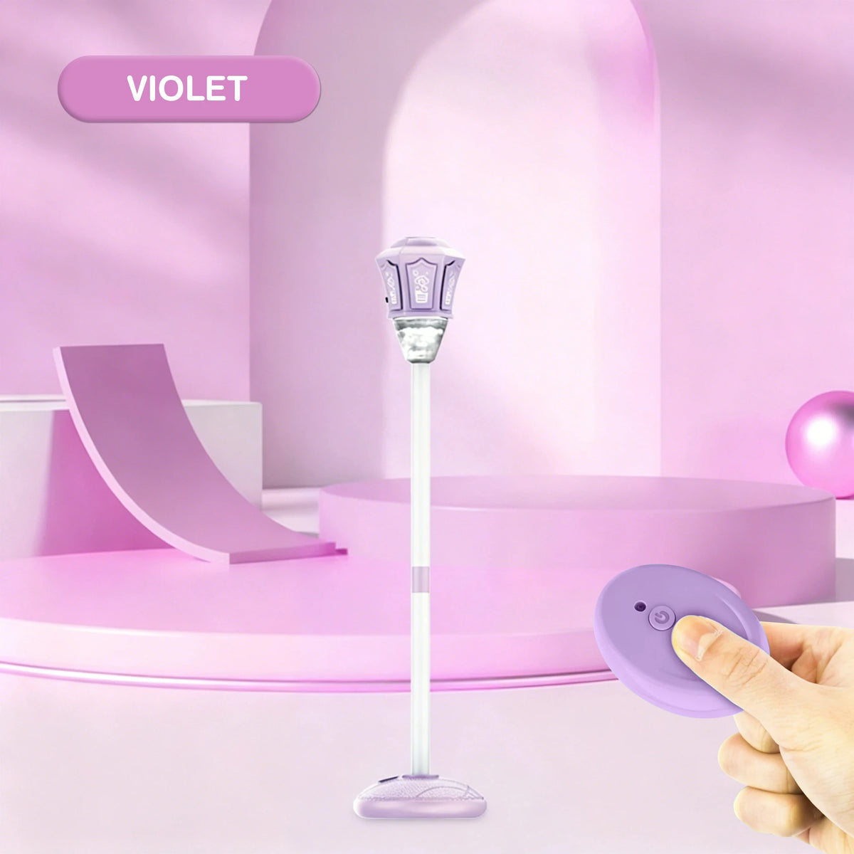 A purple automatic bubble machine with lights is shown on a pink surface.