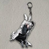 Acrylic figure stand of an anime character with white hair and dark clothing, featuring a bunny-like design.