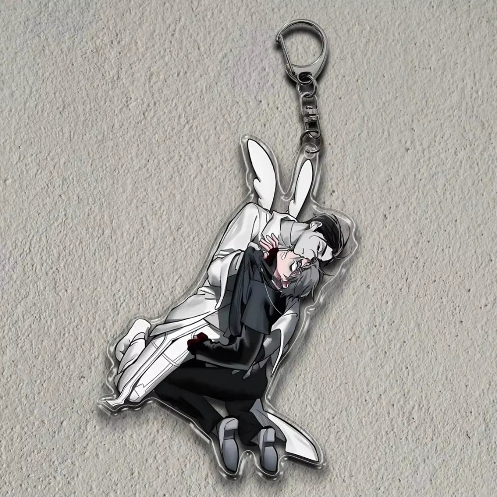 Acrylic figure stand of an anime character with white hair and dark clothing, featuring a bunny-like design.