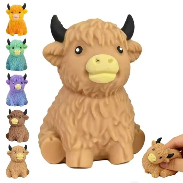A set of five glitter highland cow squishy stress relief toys in various colors and textures.