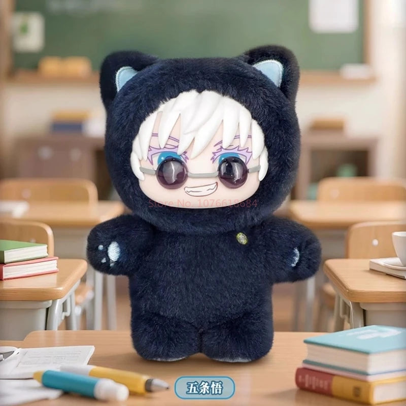A dark blue cat-eared plush toy with white hair and glasses sits on a wooden table in a classroom setting.