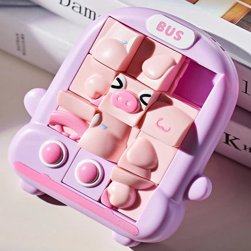 A pink animal slide puzzle for kids featuring various plastic pieces and a bus theme.