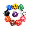 A collection of twenty dice in various colors including blue, yellow, green, purple, black, and red arranged in a circle.