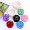 A collection of silicone molds shaped like baby feet and pentagrams for DIY crafts, including candles and soap.