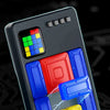 A close-up view of a magnetic suction puzzle game with colored blocks and a circular base.