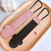 Pink and black PU leather stroller organizer hooks displayed on a wooden tray