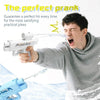 A man is using a white prank gun to spray water, demonstrating its double spray function.