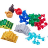 A collection of colorful building blocks and coins including gold, silver, blue, red, and green pieces.