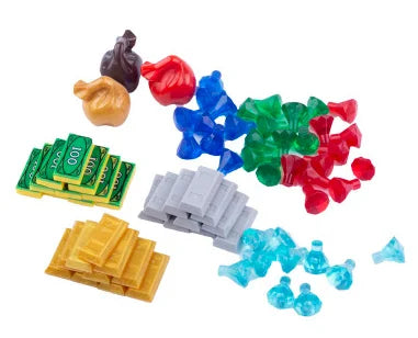 A collection of colorful building blocks and coins including gold, silver, blue, red, and green pieces.