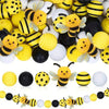 A collection of yellow and black silicone bee beads for DIY crafts.