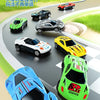 A collection of colorful die-cast cars and a blue sports car model displayed on a gray track.