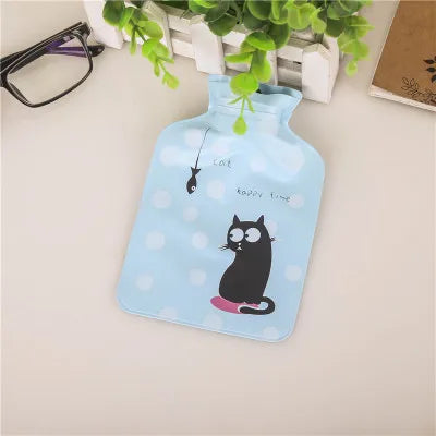 Light blue portable hot water bottle with a cat design and cozy cover