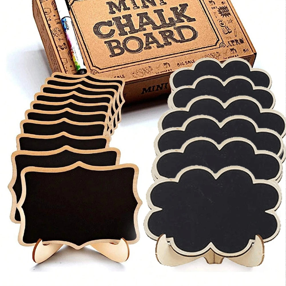 A set of mini wooden chalkboard signs with easels for decor, displayed next to a box of chalk board supplies.