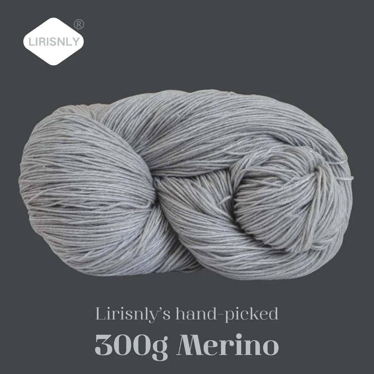 A ball of grey Merino wool yarn, hand-picked and 300g, shown against a dark background.