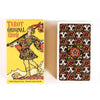 A yellow box for a Tarot Original 1909 deck featuring an illustration of a figure.