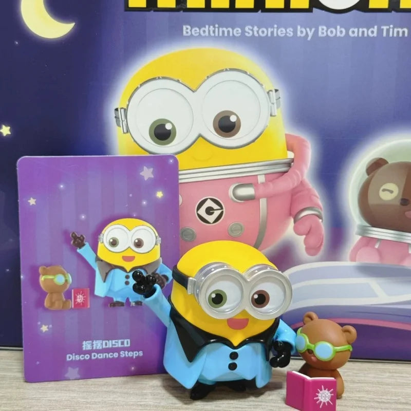 A POP MART Minions Bedtime Stories blind box figure in blue and yellow, featuring a character with large goggles.