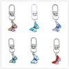 A set of silver butterfly keychains with split rings for bags and accessories