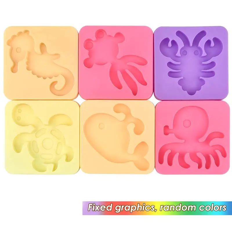 A set of five pink and yellow silicone molds for DIY craft kits featuring ocean creatures like a squid, starfish, and octopus