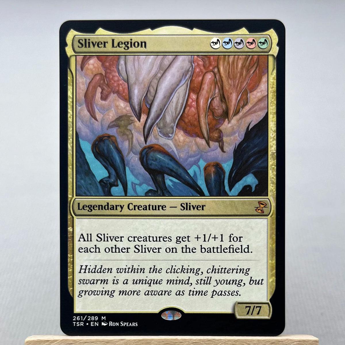 A Magic: The Gathering card featuring the Sliver Legion Legendary Creature Sliver with a 7/7 power and toughness.