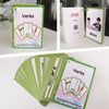 A set of pink and green flashcards featuring action verbs like run, dance, and share for children.