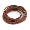 A coil of dark brown vintage faux leather cords used for DIY jewelry making.