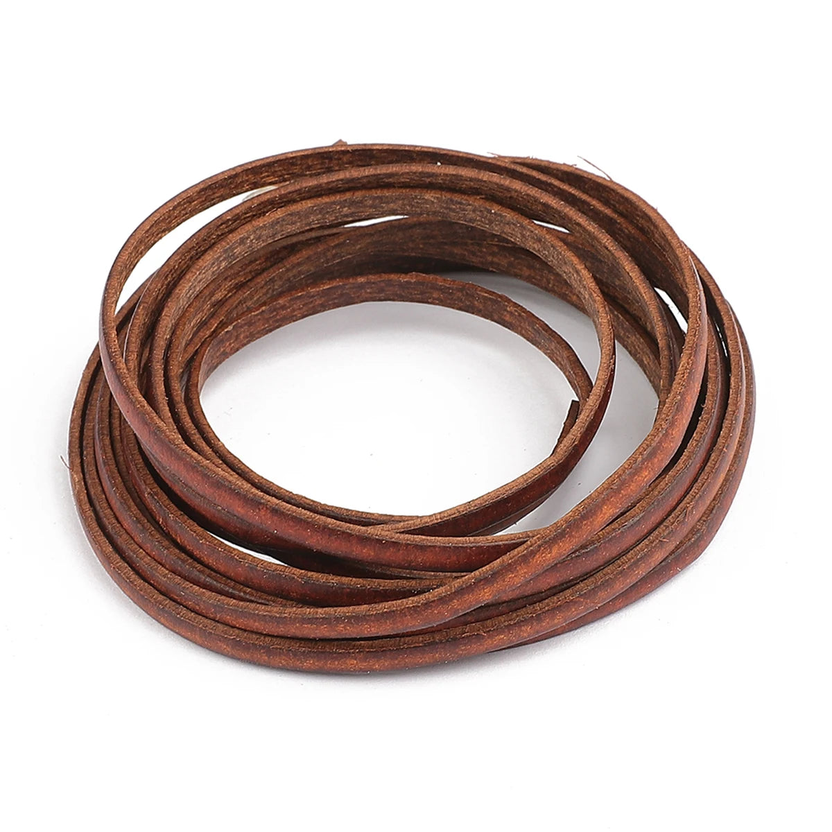 A coil of dark brown vintage faux leather cords used for DIY jewelry making.