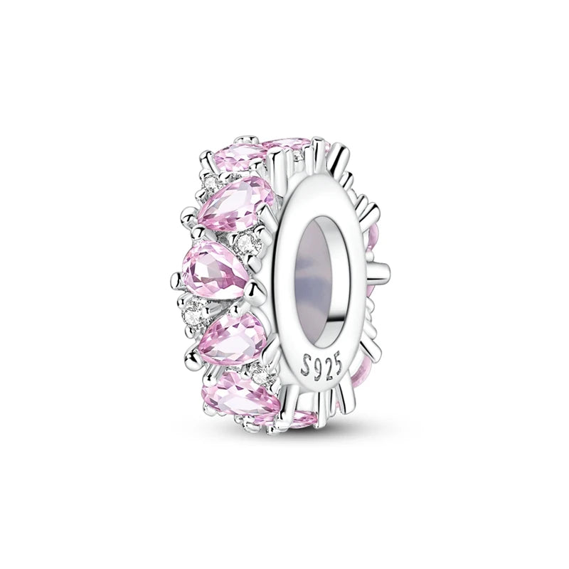 A cluster of pink zirconia heart beads set in 925 sterling silver, featuring a central oval bead.