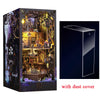 A wooden pirate ship book nook kit featuring an elaborate diorama with various nautical and historical elements.