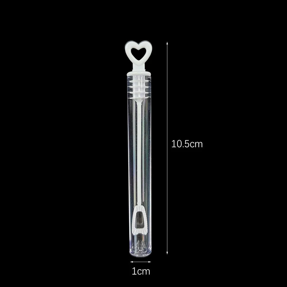 Clear glass mini bubble wand with a heart-shaped top and a handle, measuring 10.5cm long.
